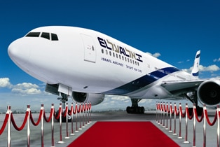 a white airplane on a runway