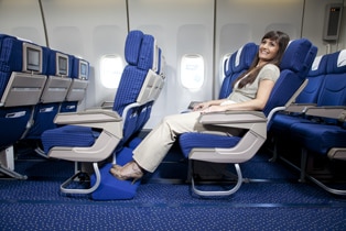 a woman sitting in a plane