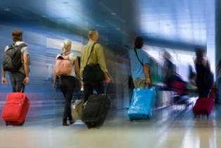 a group of people with luggage