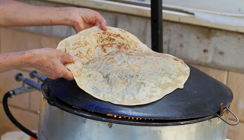 A druze pita on a tabun